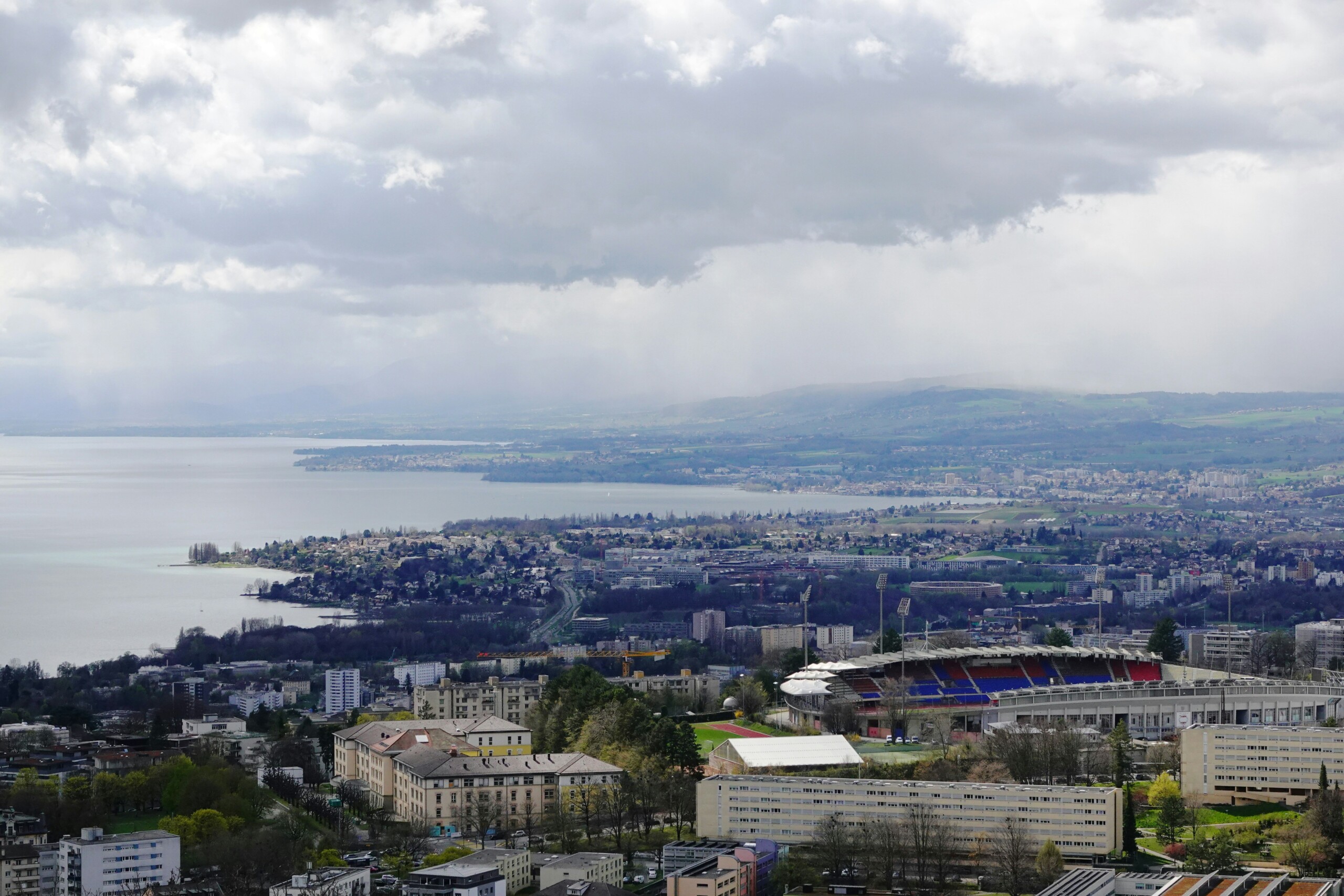 Panoramic view of Lake Geneva and Lausanne city, business district